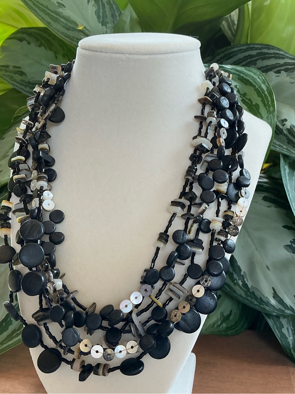 Elegant Multi-Strand Black and White Iridescent Disc And Bead Statement Necklace